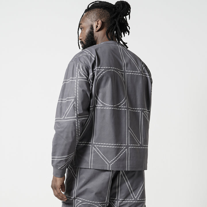 META DRY PATTERNED OVERSIZED PKT LS TEE