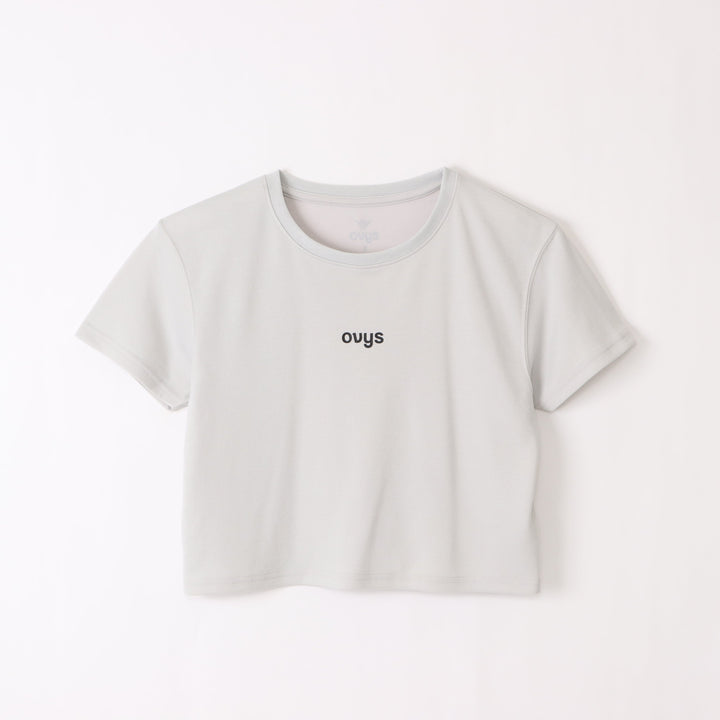 レディースミニロゴバックメッッシュクロップドTシャツのICY WHITEの平置き画像です